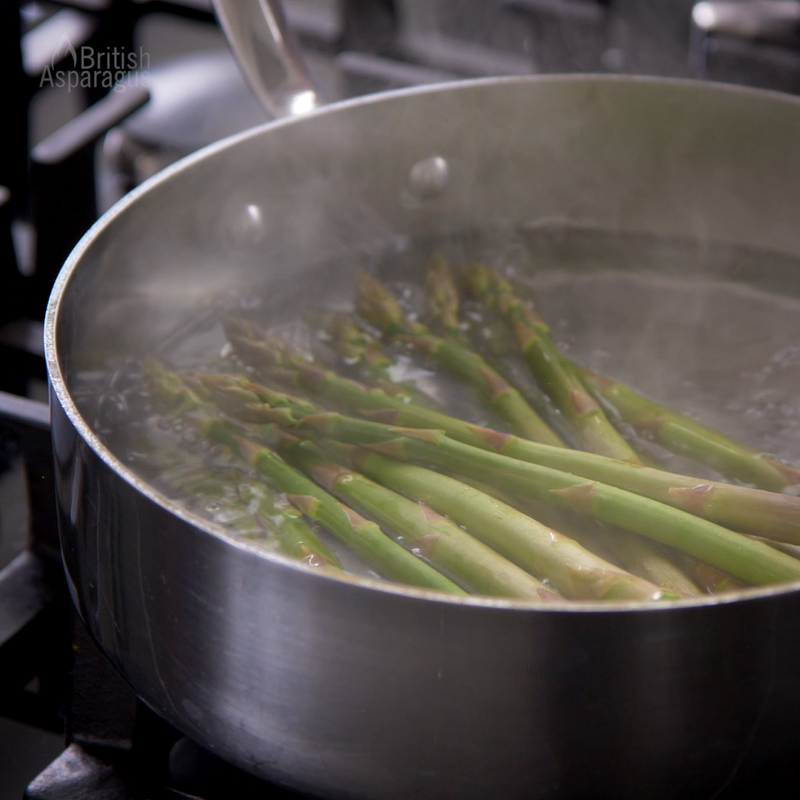 Blanched asparagus in a pan